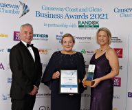 Causeway Chamber of Commerce Awards 2021 Accommodation of the Year - Darren Ward, AIB presenting to winners Marine Hotel's Joanne Boyd and Claire Hunter.   03 Chamber Awards 2021