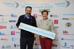 Causeway Chamber of Commerce President Anne-Marie McGoldrick with Drinks Reception Sponsor Michael Caughey of Bushmills Distillery during the launch of the Causeway Business Awards 2023 ( #causewayawards ) held at the Lodge Hotel.      05 Awards Launch 2023