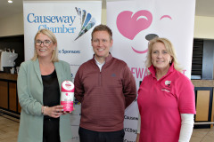 At the Causeway Chamber of Commerce golf outing at Castlerock GC are Annette Deighan with President James Kilgore with Tara Cunningham of the nominated charity Causeway Coast Dog Rescue. 02 Chamber Golf