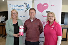 At the Causeway Chamber of Commerce golf outing at Castlerock GC are Annette Deighan with President James Kilgore with Tara Cunningham of the nominated charity Causeway Coast Dog Rescue.    02 Chamber Golf