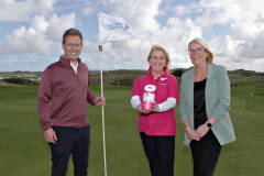 Chamber President James Kilgore on the Chamber '18th' with Tara Cunningham of the nominated charity Causeway Coast Dog Rescue  with Chamber manager Annette Deighan.    07 Chamber Golf