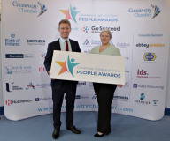 At Portrush Town Hall for the People Awards Launch is Causeway Chamber of Commerce President James with Graduate of the Year award sponsor Siobhan Huston-Beer of Eakin Healthcare.  02 Chamber People Awards