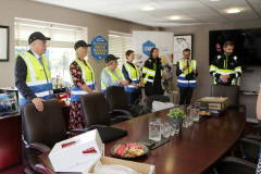 Members of Causeway Chamber of Commerce dressed for a tour of Lynas Foodservice warehousing.   05 Minister at Lynas'