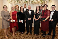 Chamber President David Boyd with Frances Lundy and the staff of Riada Resources at the Annual President's Dinner held in the Lodge Hotel.     25 Causeway