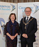 Sue Gray, Permanent Sec for the Dept of Finance welcomed to the Causeway Chamber's President's Business Lunch by Chamber President Murray Bell.   18 Presidents Lunch