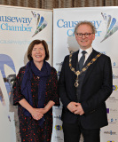 Sue Gray, Permanent Sec for the Dept of Finance welcomed to the Causeway Chamber's President's Business Lunch by Chamber President Murray Bell. 18 Presidents Lunch