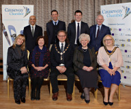 The top table at the Causeway Chamber's President's Business Lunch are, seated, Karen Yates Chief Executive Causeway Chamber, Sue Gray, Permanent Sec for the Dept of Finance, Chamber President Murray Bell, Mrs Joan Christie, Lord Lieutenant for Co Antrim and Causeway Mayor Cllr Brenda Chivers, standing, Rajesh Rana of Andras House, Richard Baker Causeway Coast and Glens Council, Mark Donnelly of Merrow Hotel and Spa and Brian McGrath President of Derry-Londonderry Chamber of Commerce. 22 Presidents Lunch