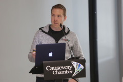 Dr Jonny Bloomfield Health and Performance Coach speaking at the Causeway Chamber of Commerce's conference on Skills, Scaling and Social Values held at the Marine Hotel In Ballycastle.